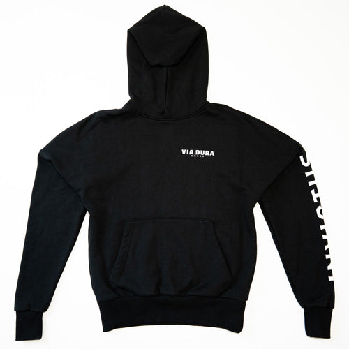 Sculptor I Hoodie in Black — front, Via Dura MMXXV chest print